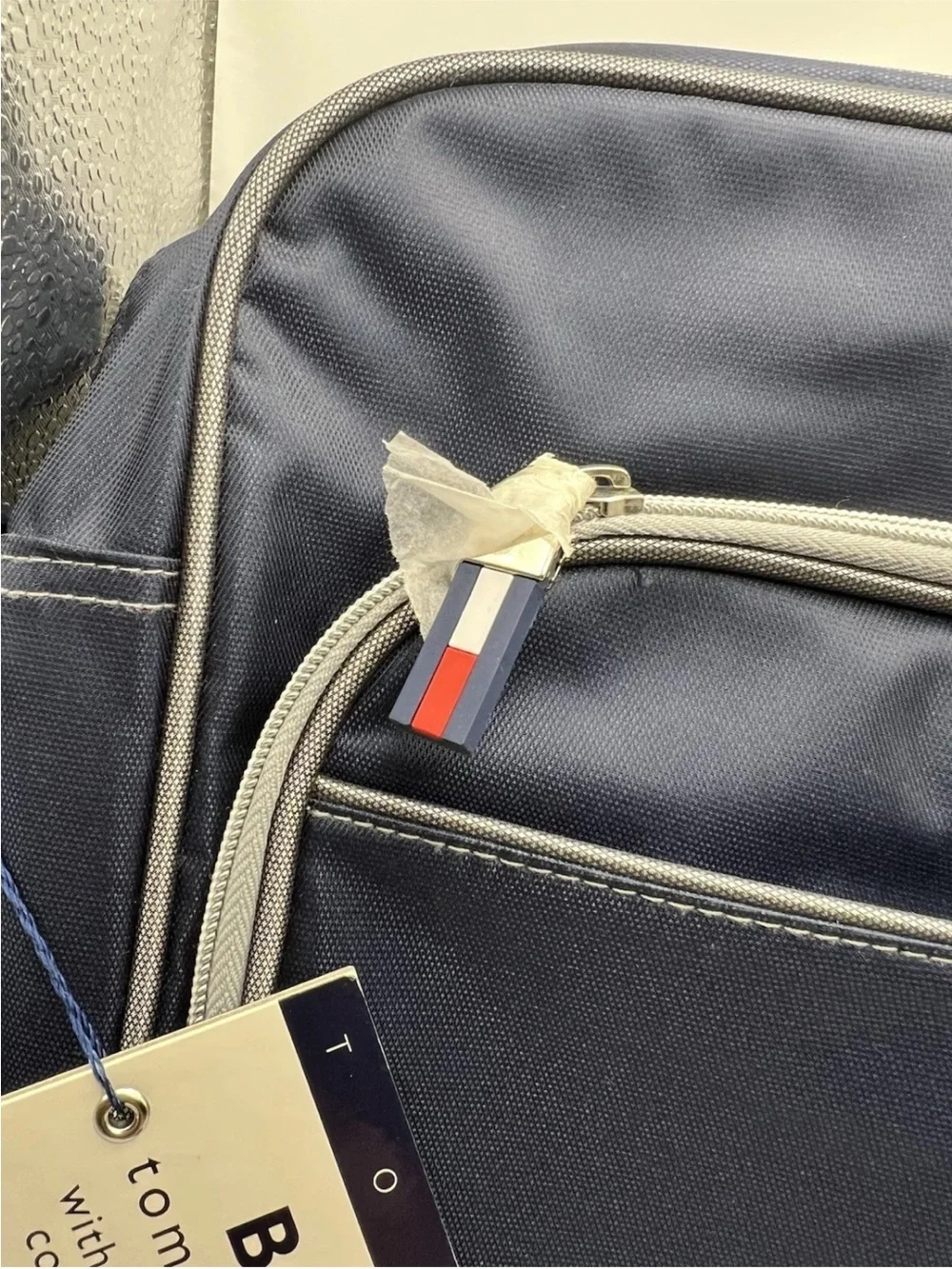NEW Tommy Hilfiger Navy Messenger Bag with Front Pocket + Audio Cord Opening